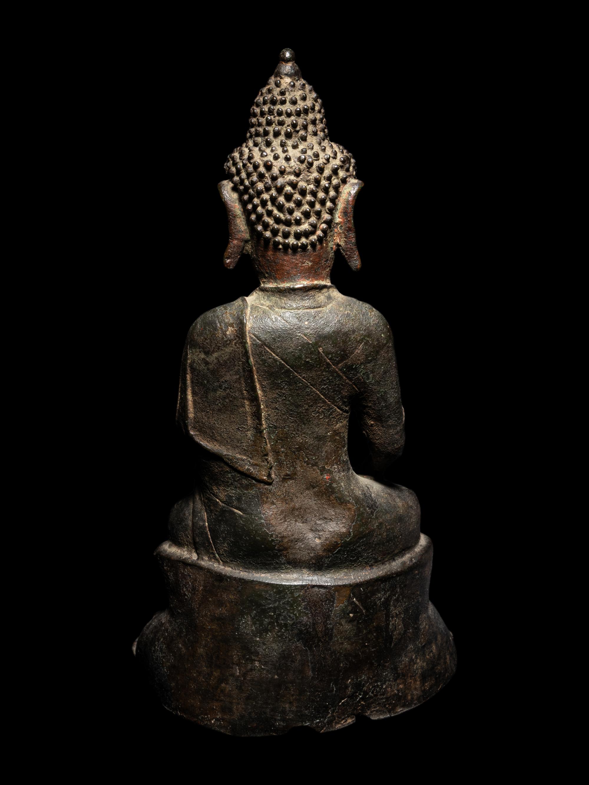 A Bronze Figure of Seated Buddha