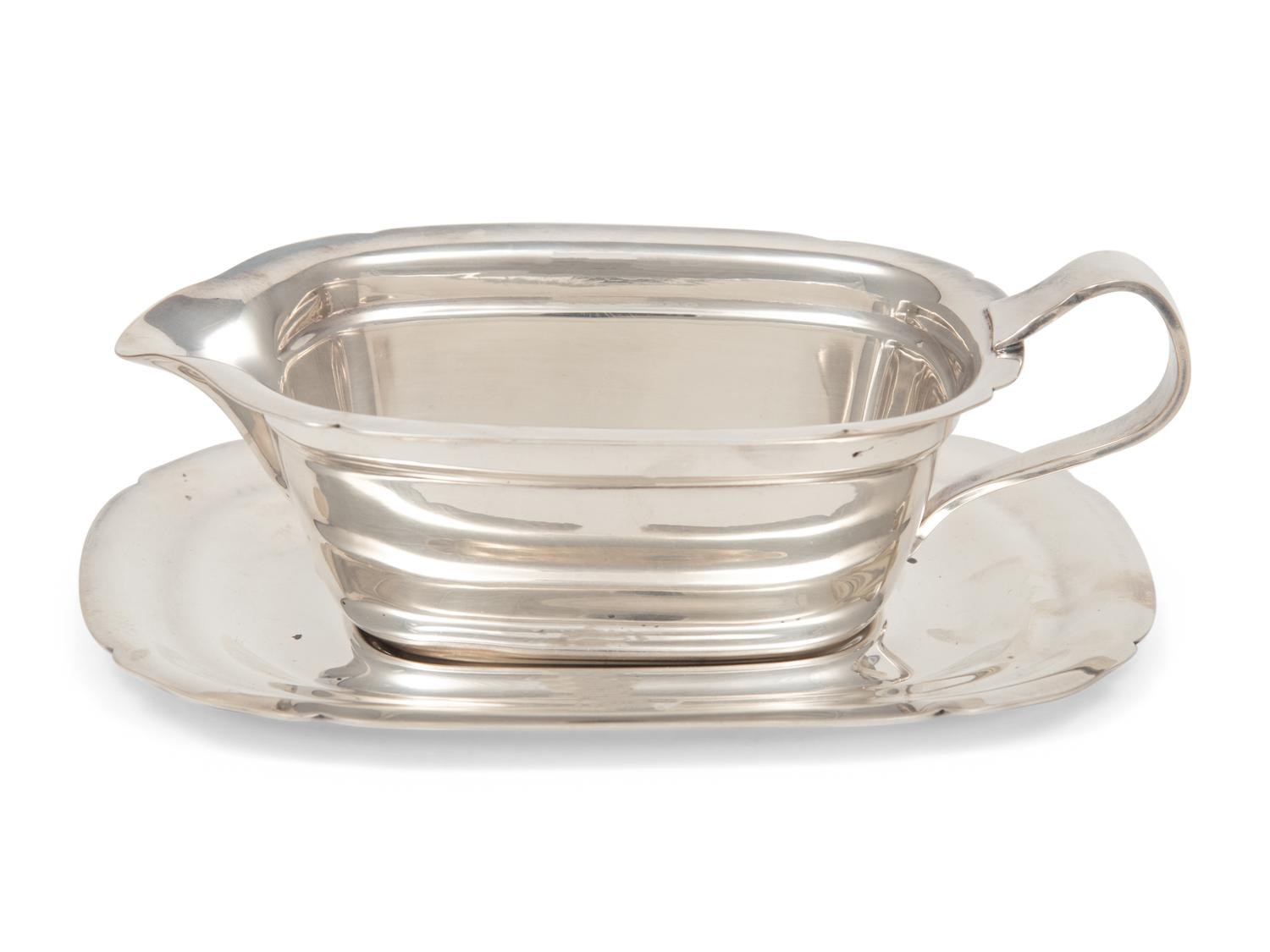 A Reed & Barton Silver-Plate Creamer and Underplate