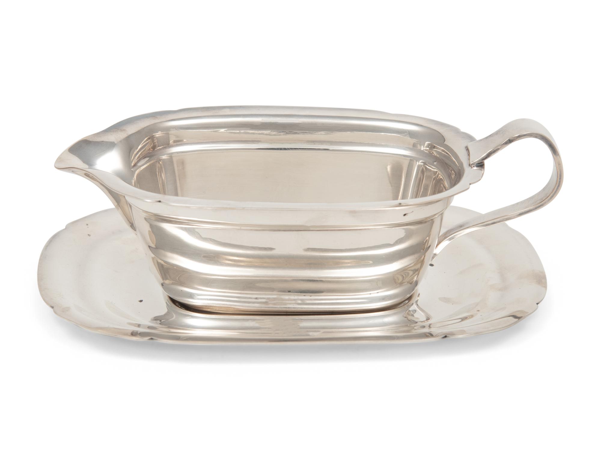 A Reed & Barton Silver-Plate Creamer and Underplate