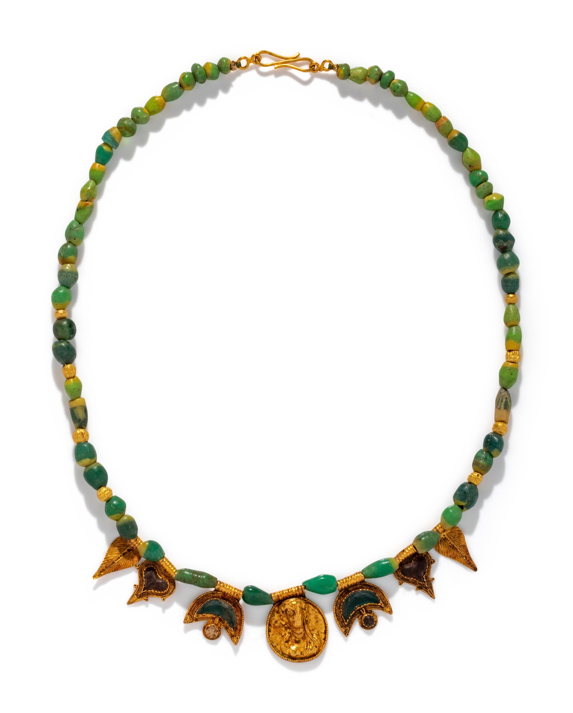 A Roman Gold and Glass Bead Necklace with a Portrait Head Medallion