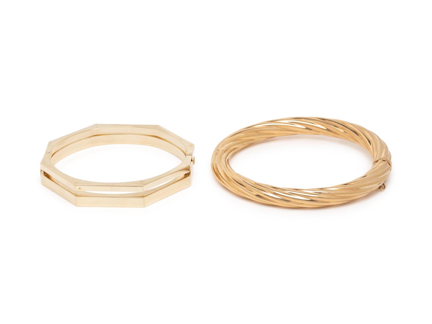 THREE YELLOW GOLD BANGLE BRACELETS