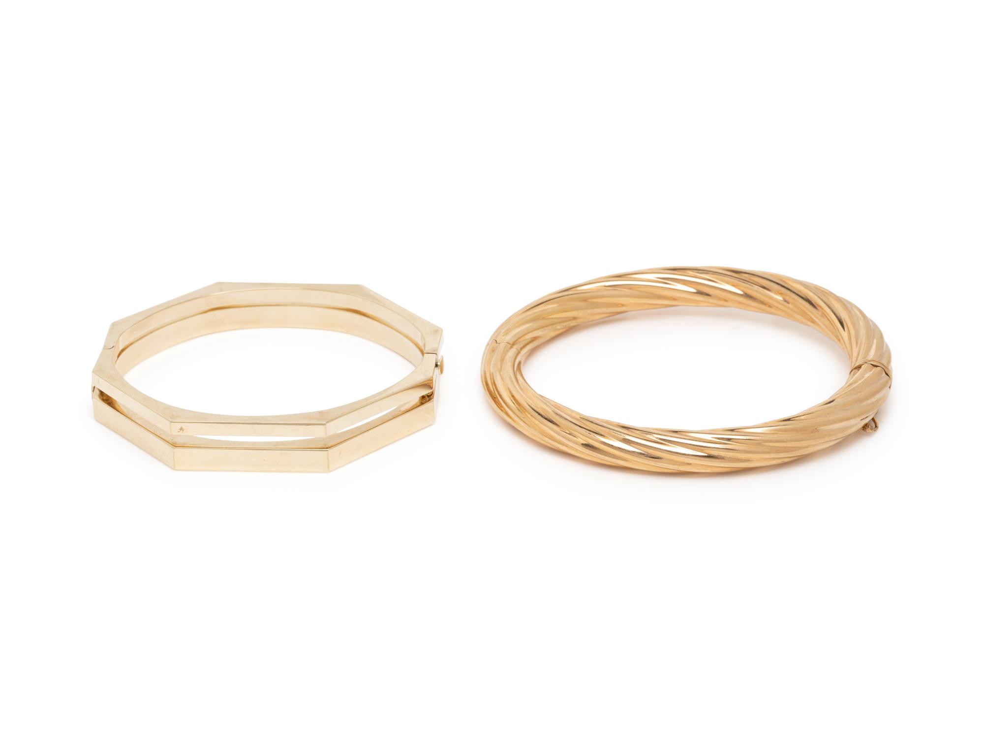 THREE YELLOW GOLD BANGLE BRACELETS