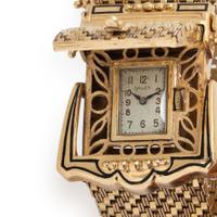 GRUEN, 14K YELLOW GOLD SURPRISE WATCH