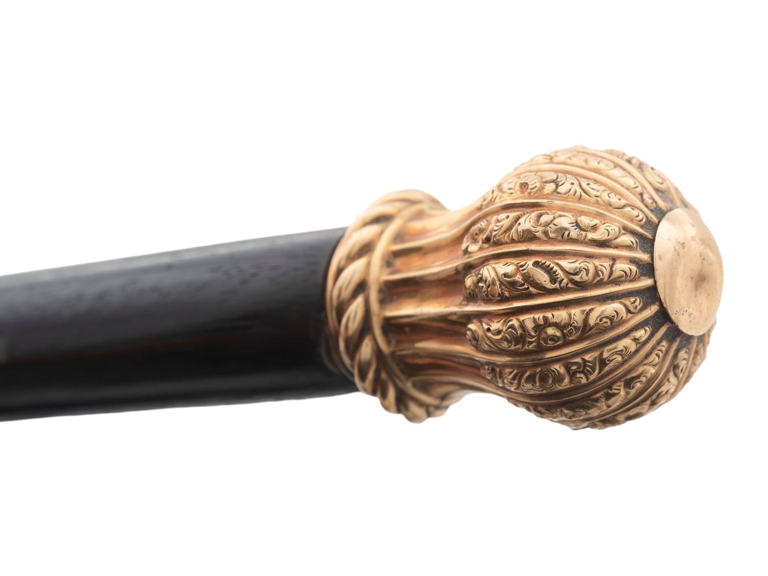 Four Gold Plated Handled Walking Sticks