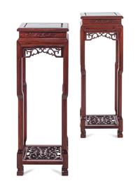 A Pair of Chinese Carved Hardwood Stands