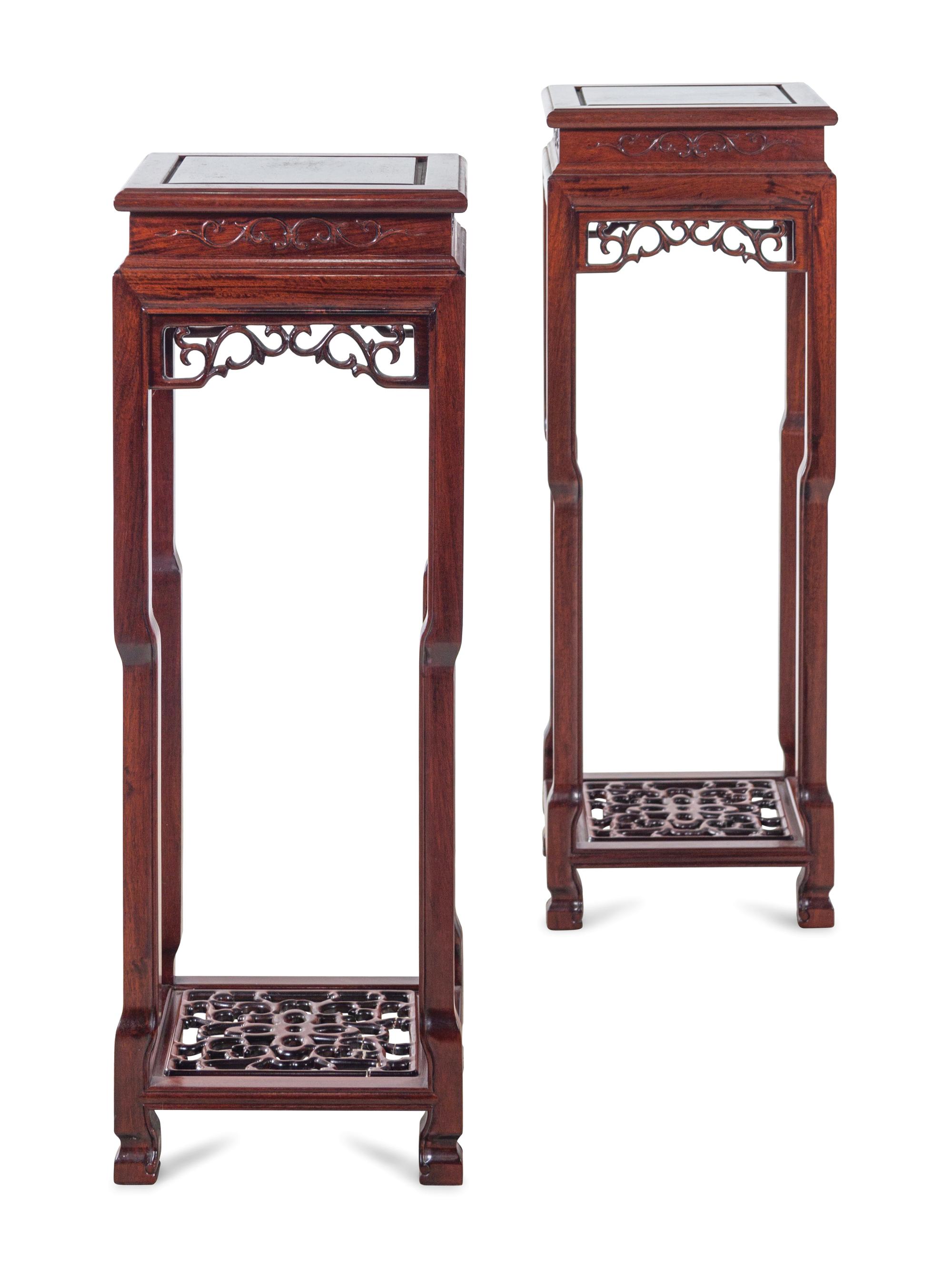 A Pair of Chinese Carved Hardwood Stands