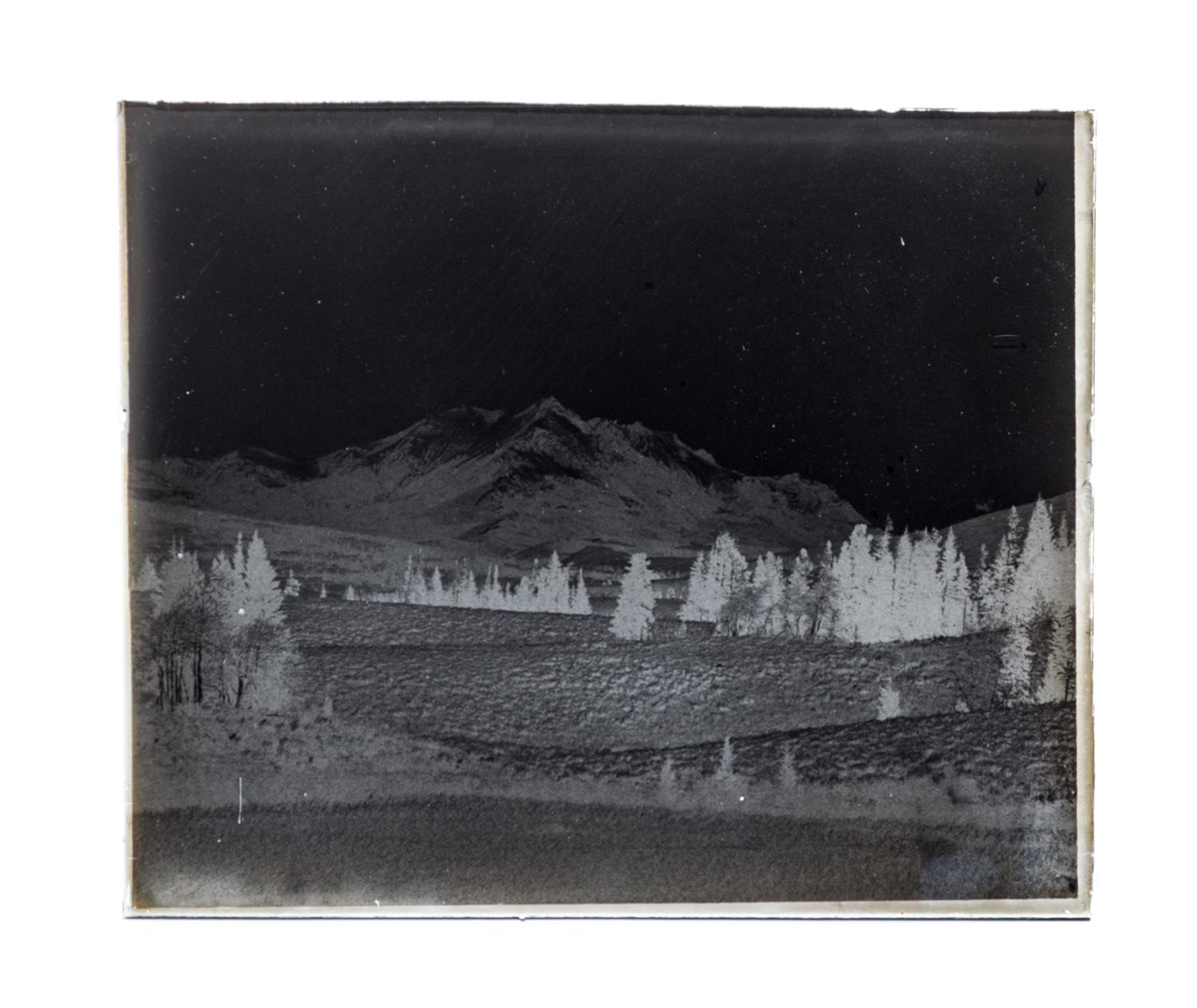 (CHICAGO), PHOTOGRAPHY. A collection of galss plate negatives including scenes of Yellow Stone National Park. Together with camera