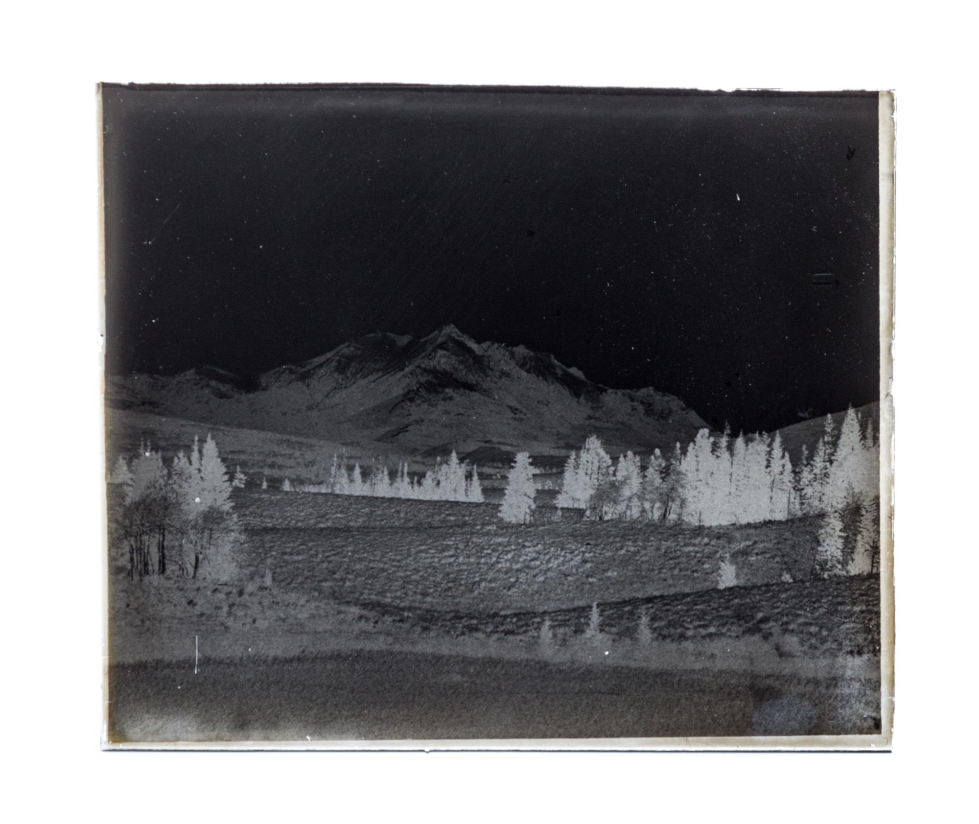 (CHICAGO), PHOTOGRAPHY. A collection of galss plate negatives including scenes of Yellow Stone National Park. Together with camera