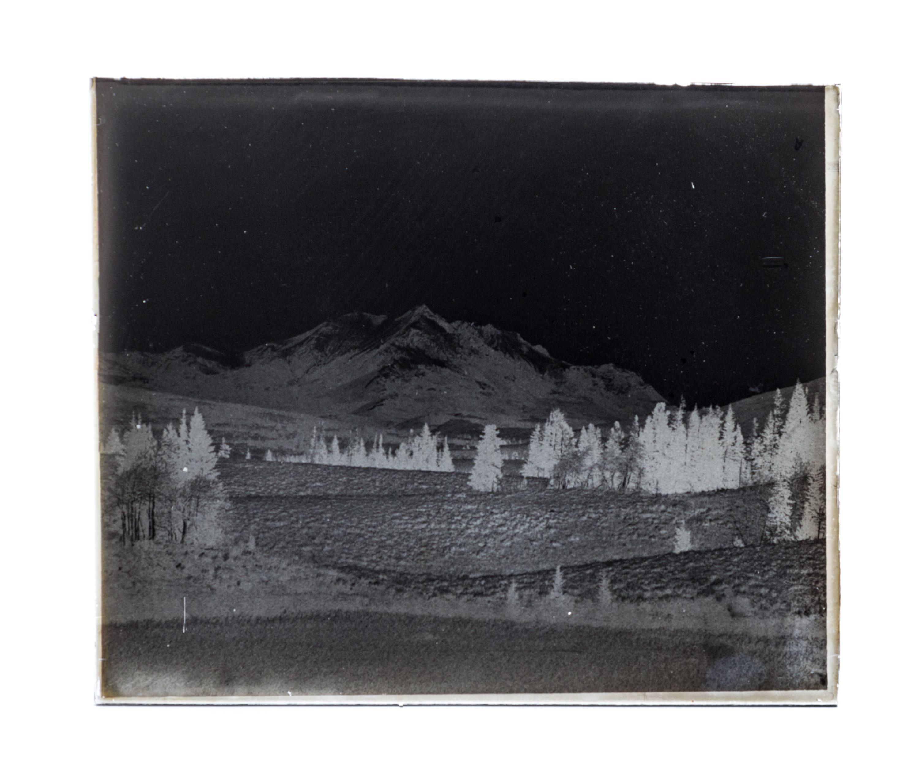 (CHICAGO), PHOTOGRAPHY. A collection of galss plate negatives including scenes of Yellow Stone National Park. Together with camera