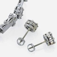 A diamond bracelet and matching diamond stud earrings