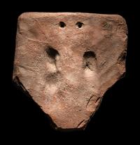 A Romano-Egyptian Terracotta Plaque of Bes and Bessette