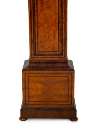 A Queen Anne Ash, Yew and Walnut Longcase Clock