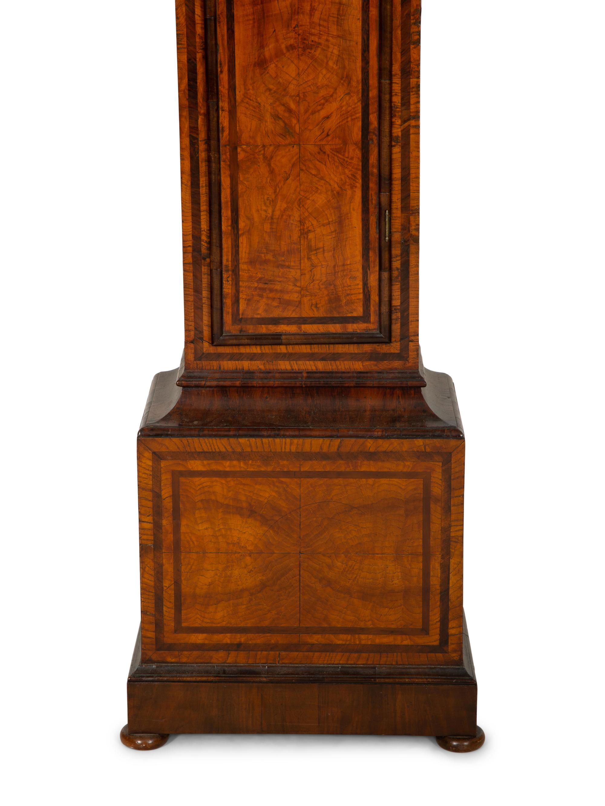 A Queen Anne Ash, Yew and Walnut Longcase Clock