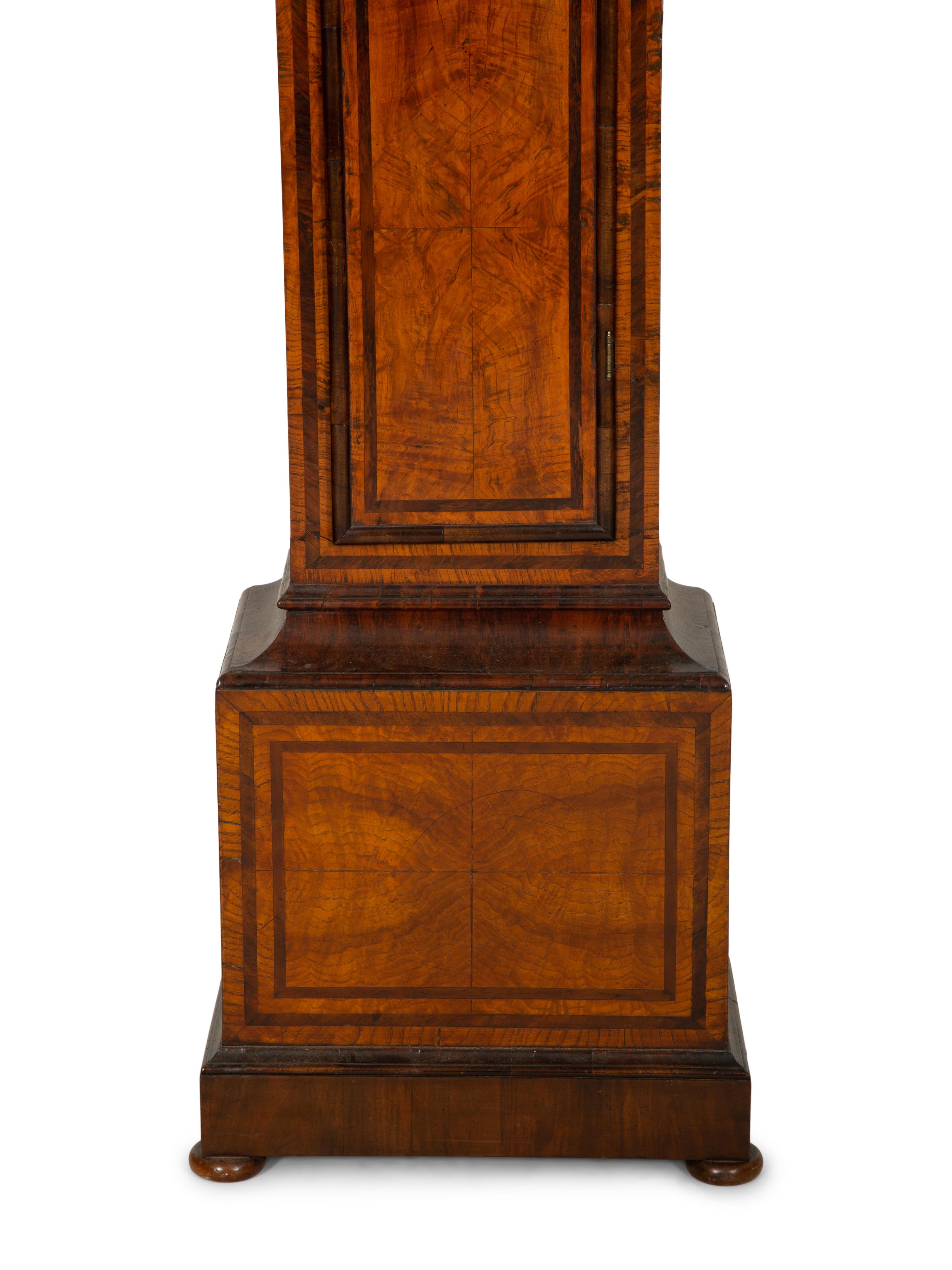 A Queen Anne Ash, Yew and Walnut Longcase Clock