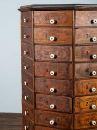An American Bolt and Screw Case Company Stenciled Pine Octagonal Rotating Cabinet