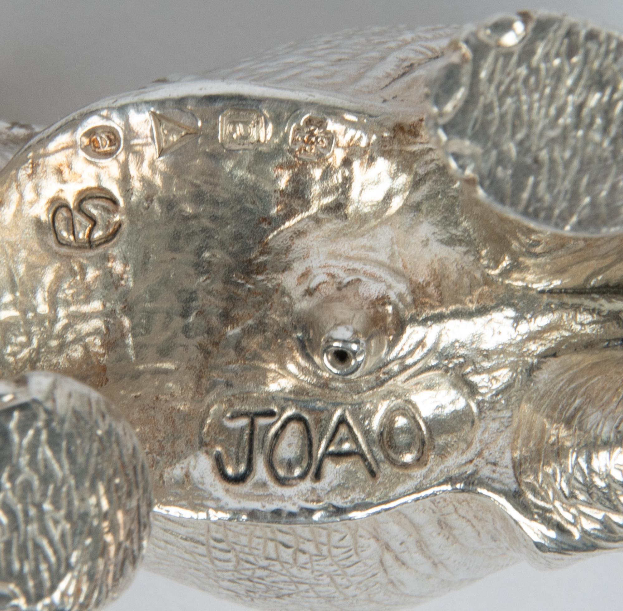 A Group of Nine Patrick Mavros Silver Elephants