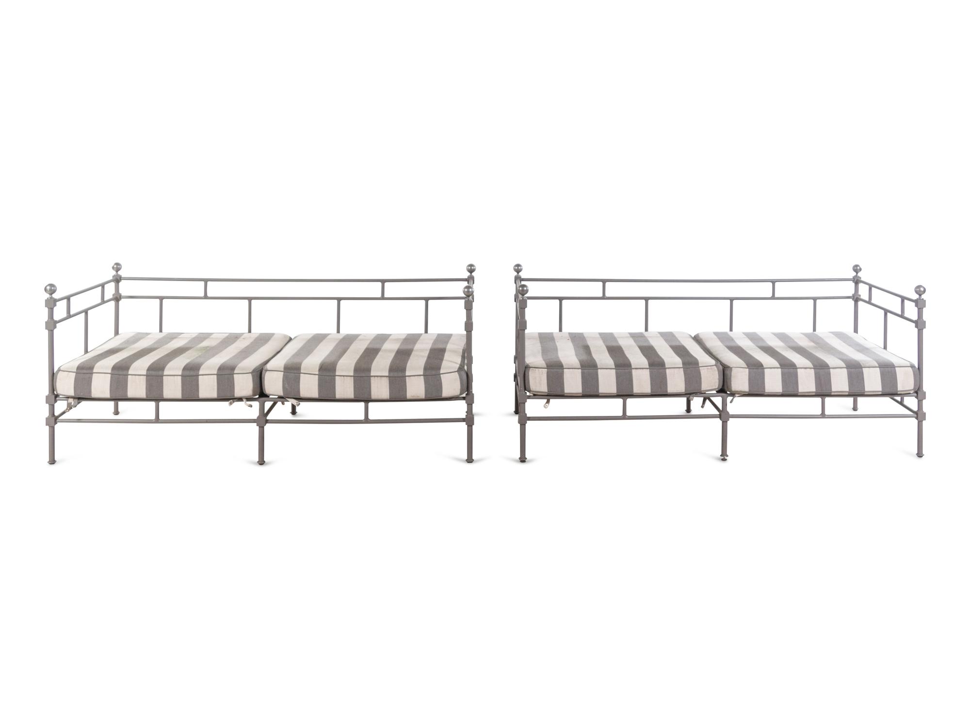 A Pair of Painted Metal Patio Sofas