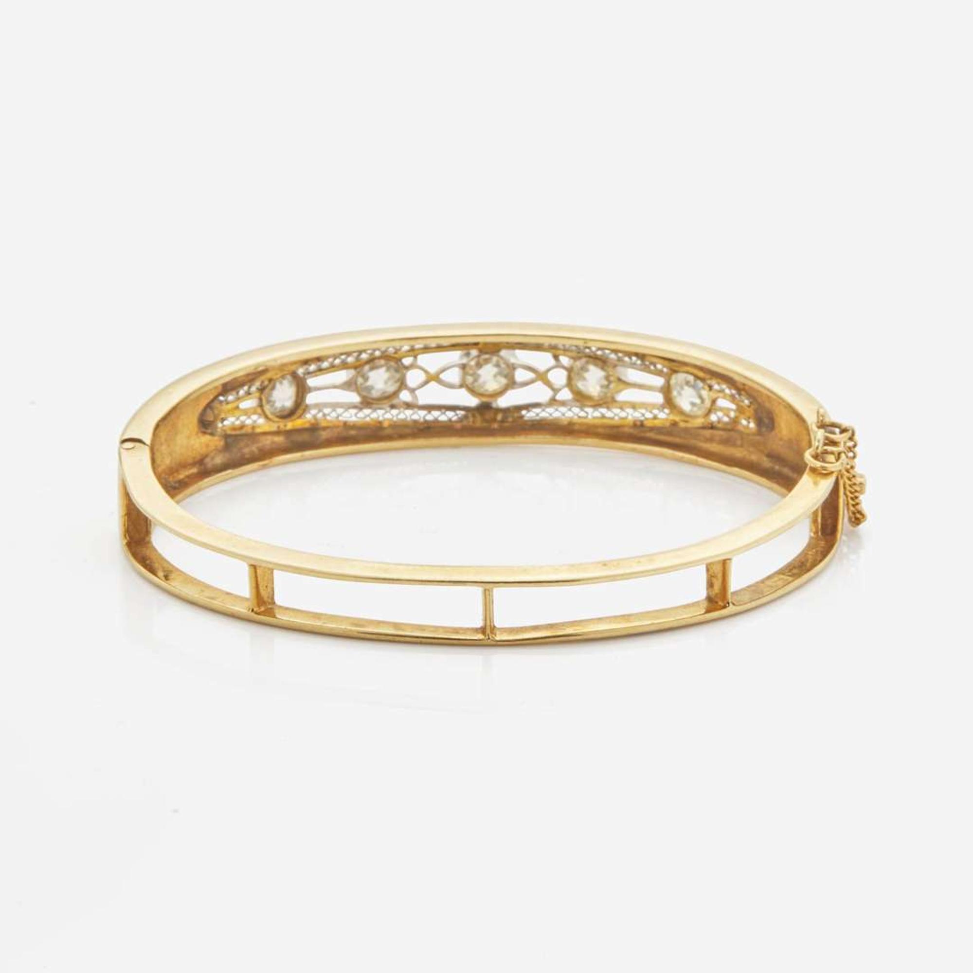 A 14K Yellow Gold and Diamond Bracelet