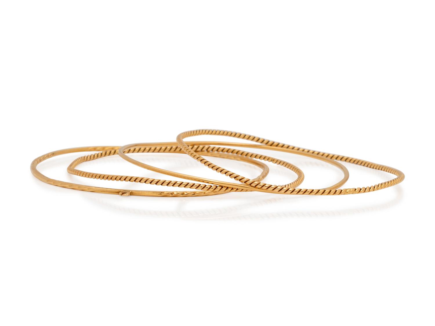 A Collection of Yellow Gold Bangle Bracelets,