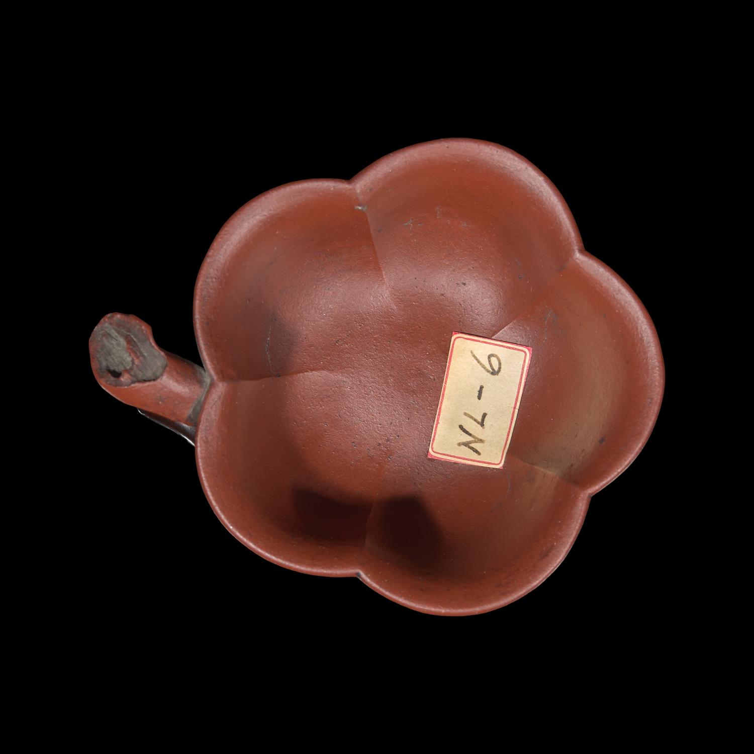 A Rare Yixing 'Prunus Blossom' Coupe with Impressed Seal 'Mingyuan', and Wood Stand 陳鳴遠款朱泥紫砂梅花杯