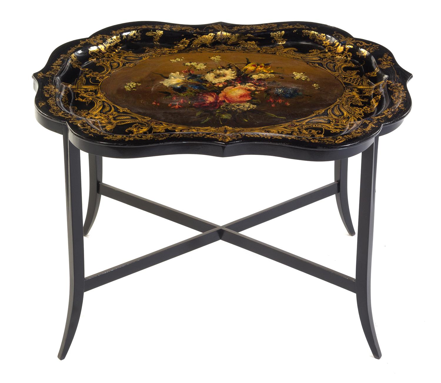 A Victorian Black Lacquered, Gilt and Polychrome Painted Papier Mache Tray on Stand Width of tray 31 inches. — 19TH CENTURY