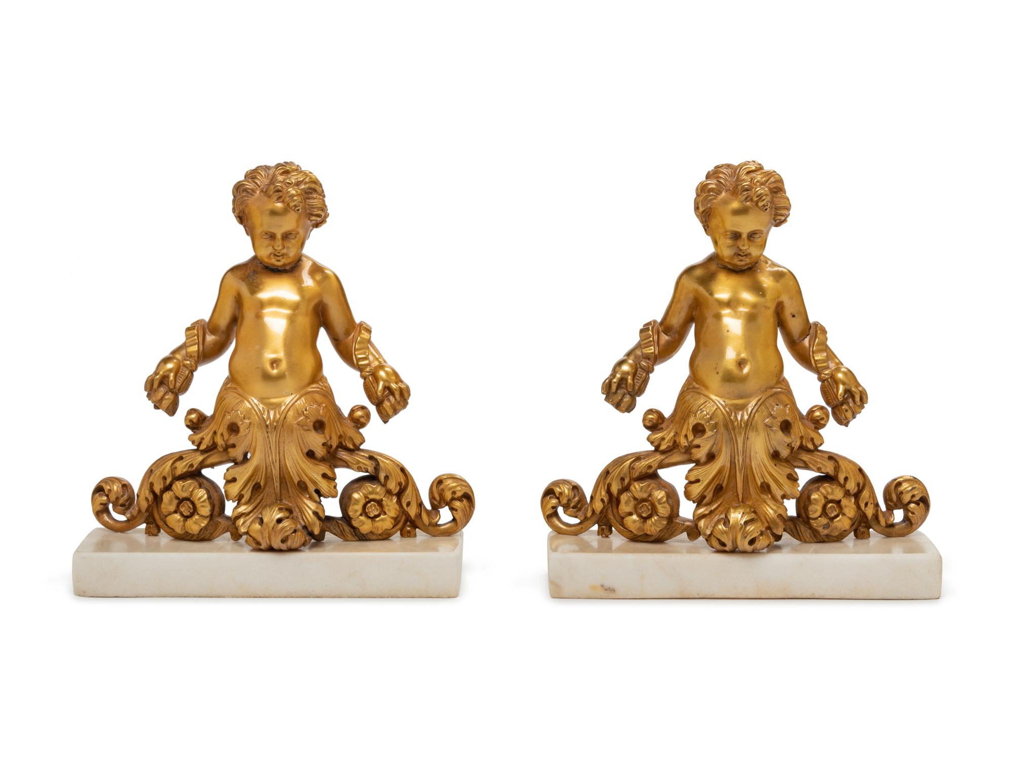 A Pair of Louis XV Gilt Bronze Figural Bookends