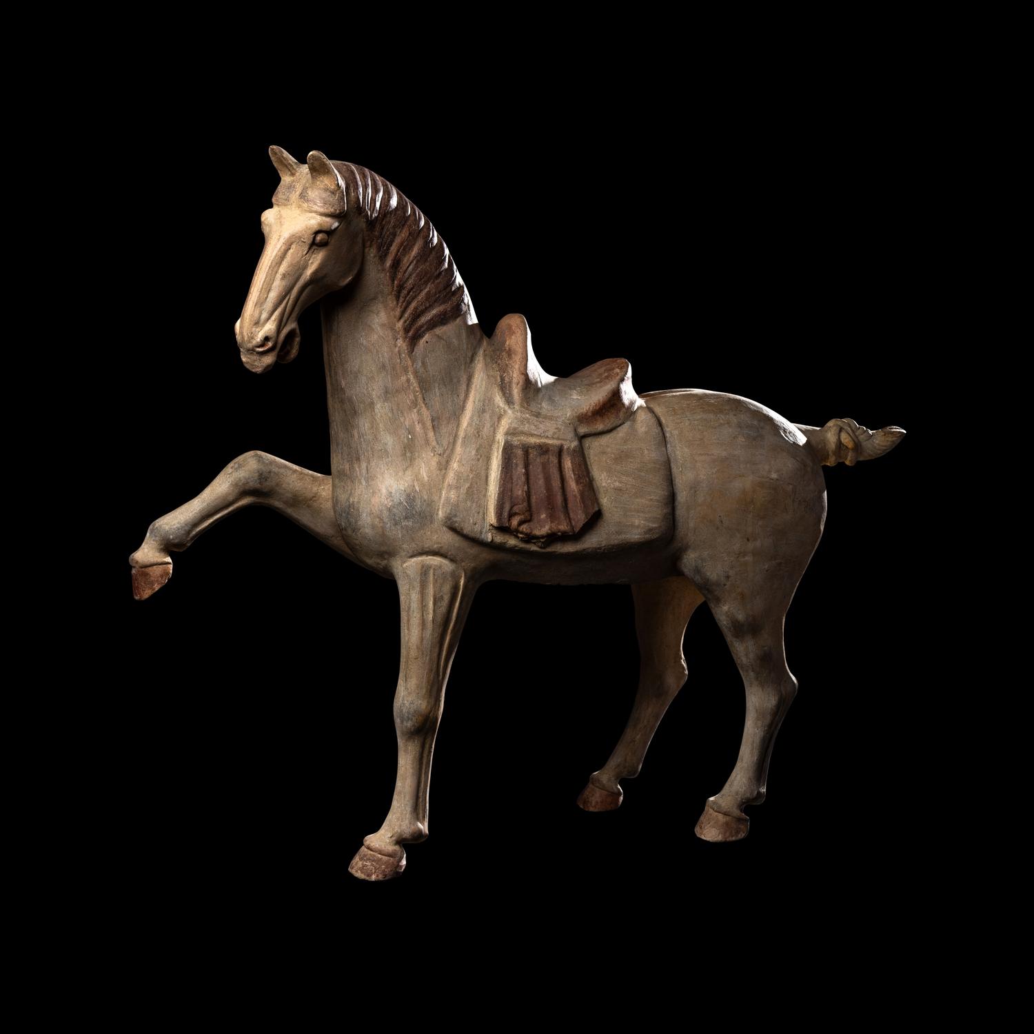 A Chinese Painted Pottery Figure of a Horse