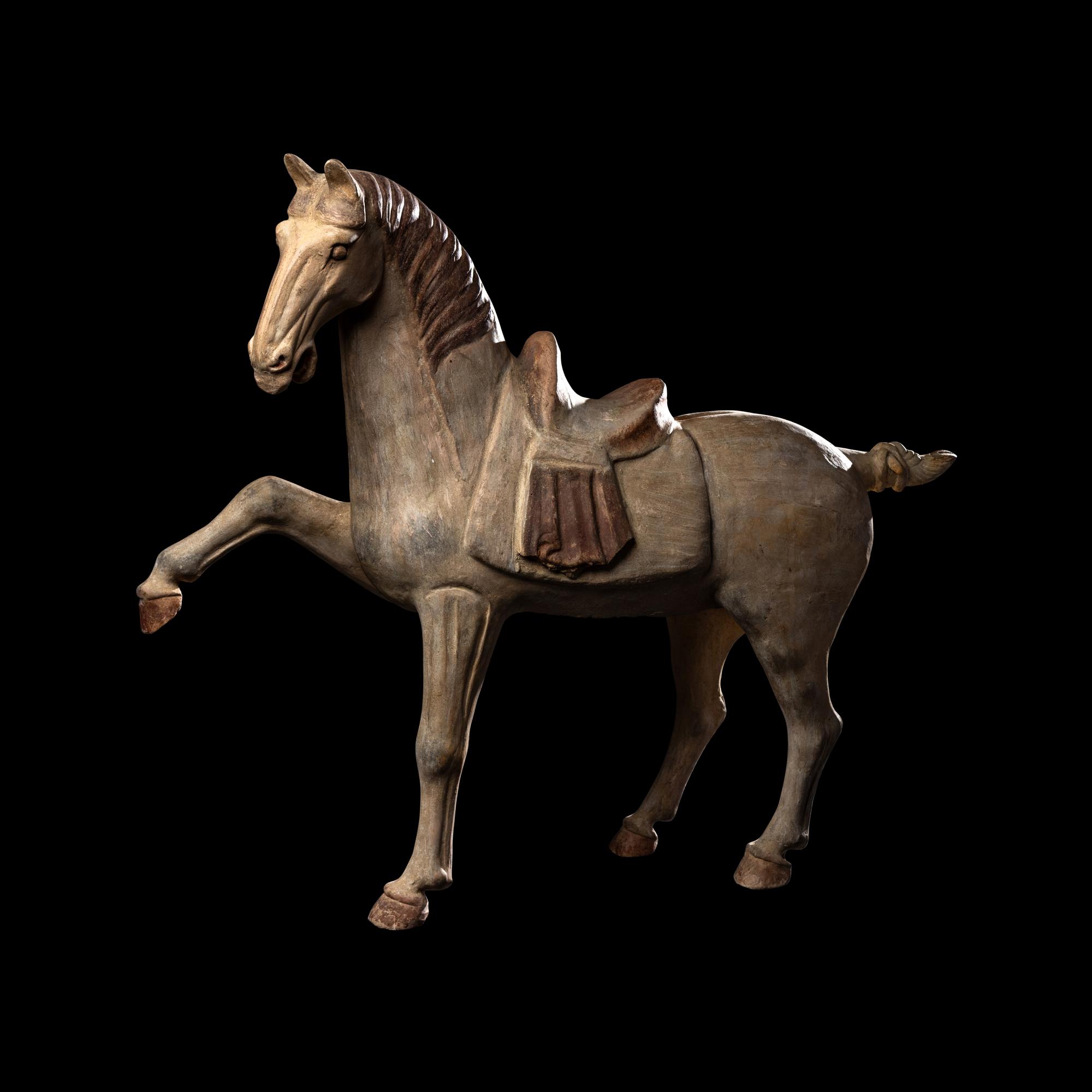A Chinese Painted Pottery Figure of a Horse