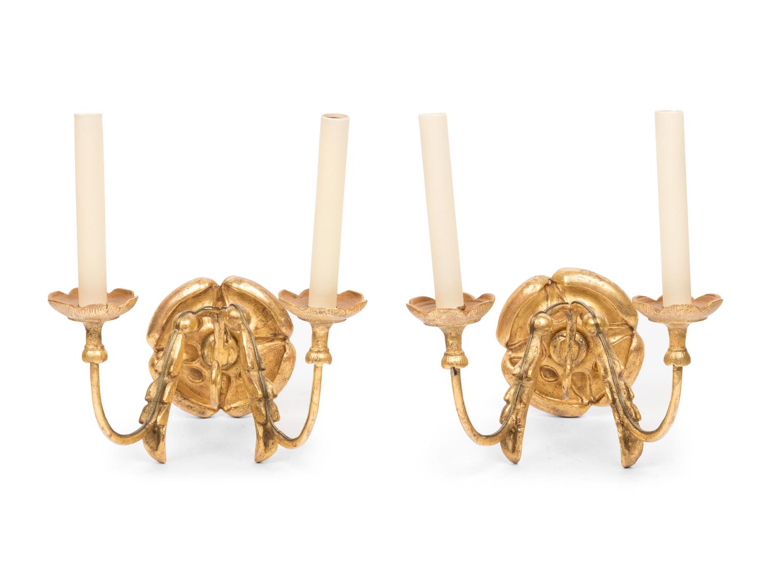A Set of Eight Continental Giltwood Three-Light Sconces