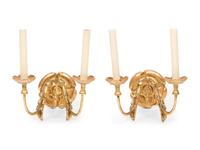 A Set of Eight Continental Giltwood Three-Light Sconces