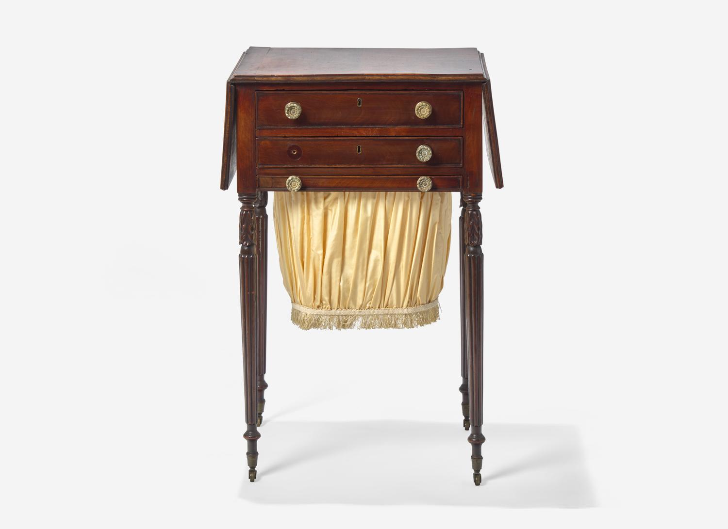 A Federal Carved and Figured Mahogany Work Table
