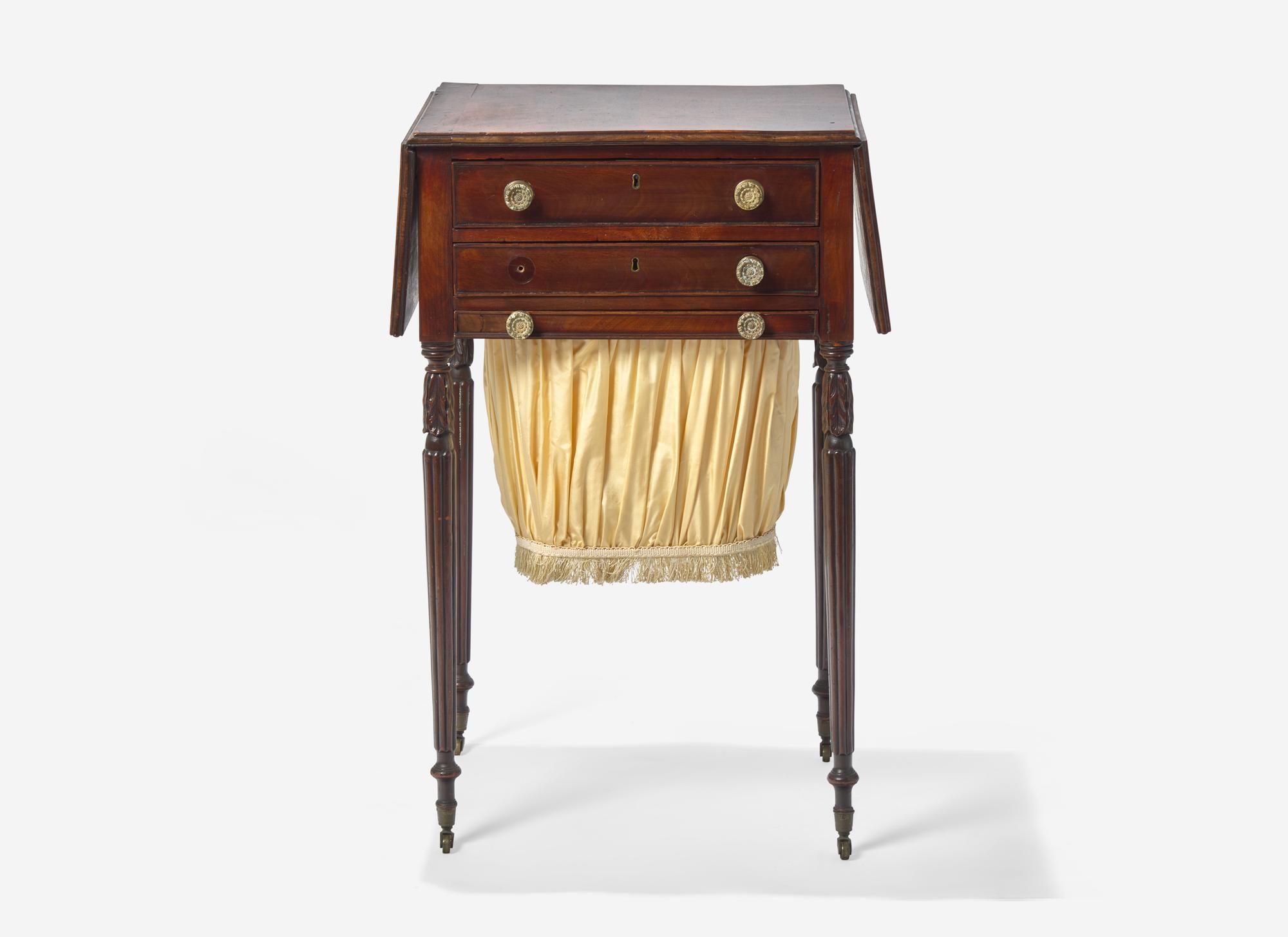 A Federal Carved and Figured Mahogany Work Table
