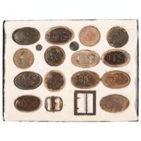 Large Riker Case of 15 Dug Civil War Plates Including a C.S. Frame, and 14 U.S. Plates