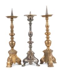 A Pair of Continental Brass Tripod Base Pricket Sticks