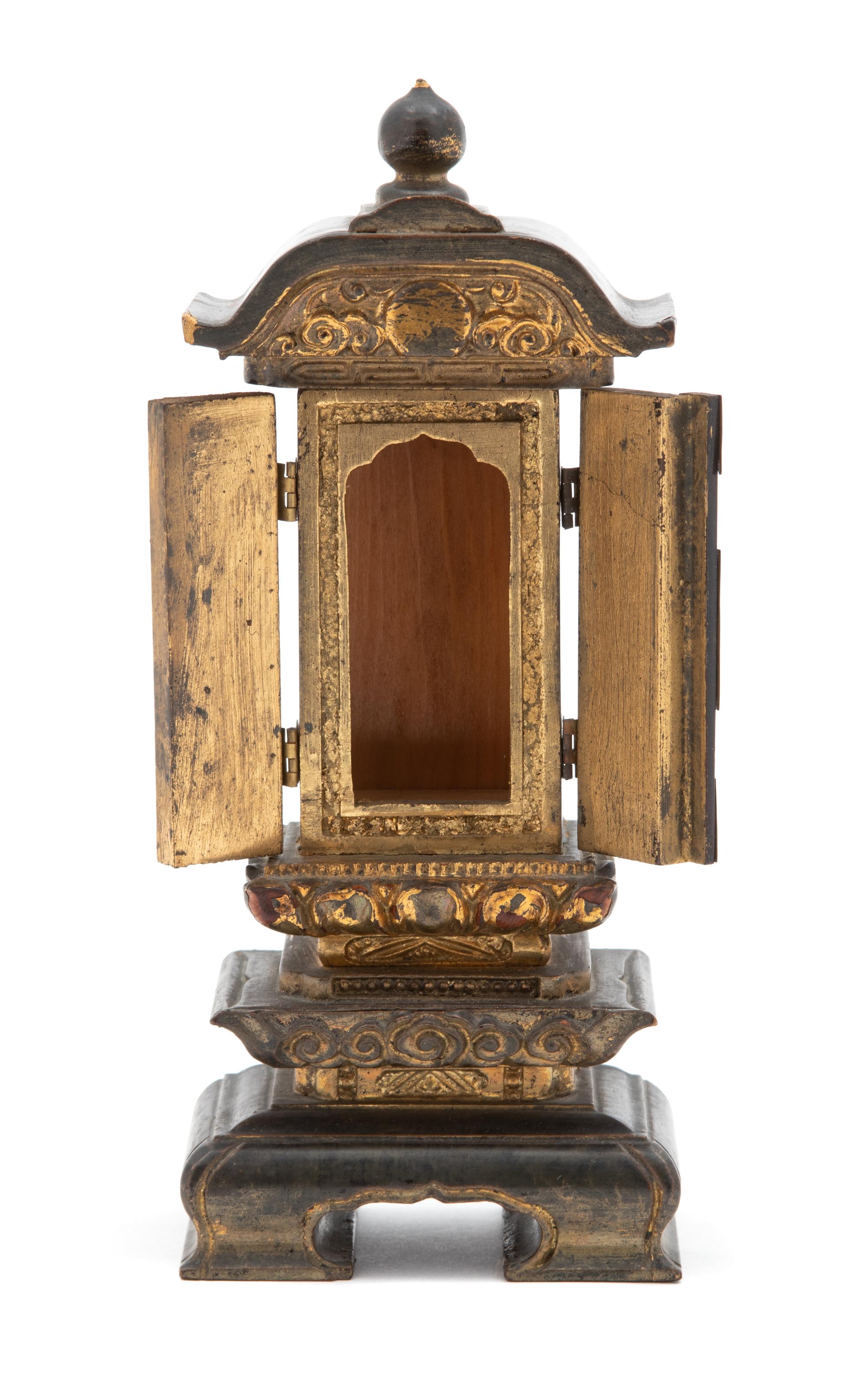 A Japanese Diminutive Gilt Decorated Black Lacquered Wood Shrine Height 7 1/2 inches. — 19TH CENTURY