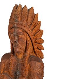 A Carved Wood Figure of an Indian by Don Colp (American, b. 1932)