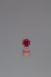 A 0.48 Carat Radiant Cut Fancy Red Diamond,