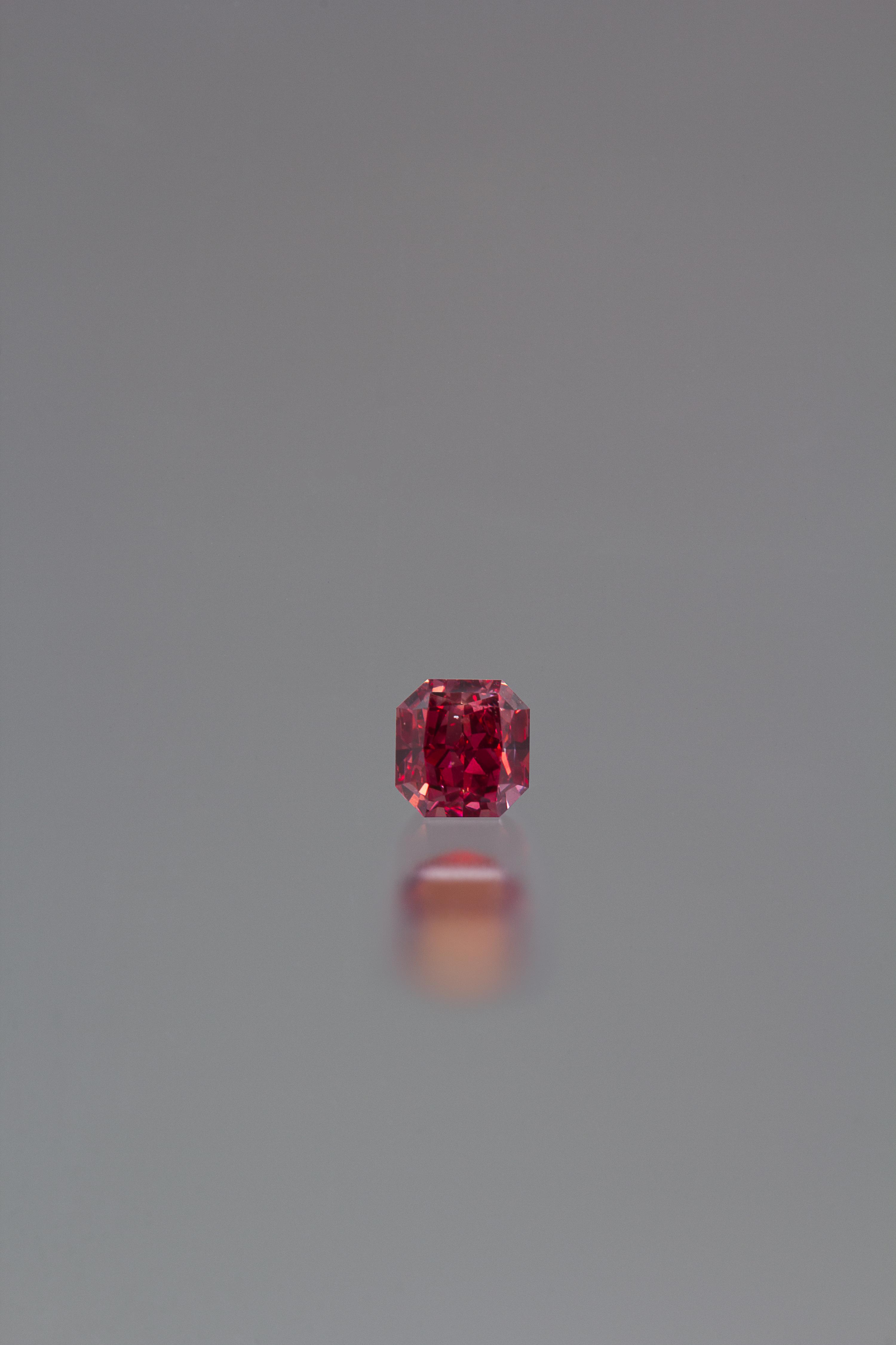 A 0.48 Carat Radiant Cut Fancy Red Diamond,