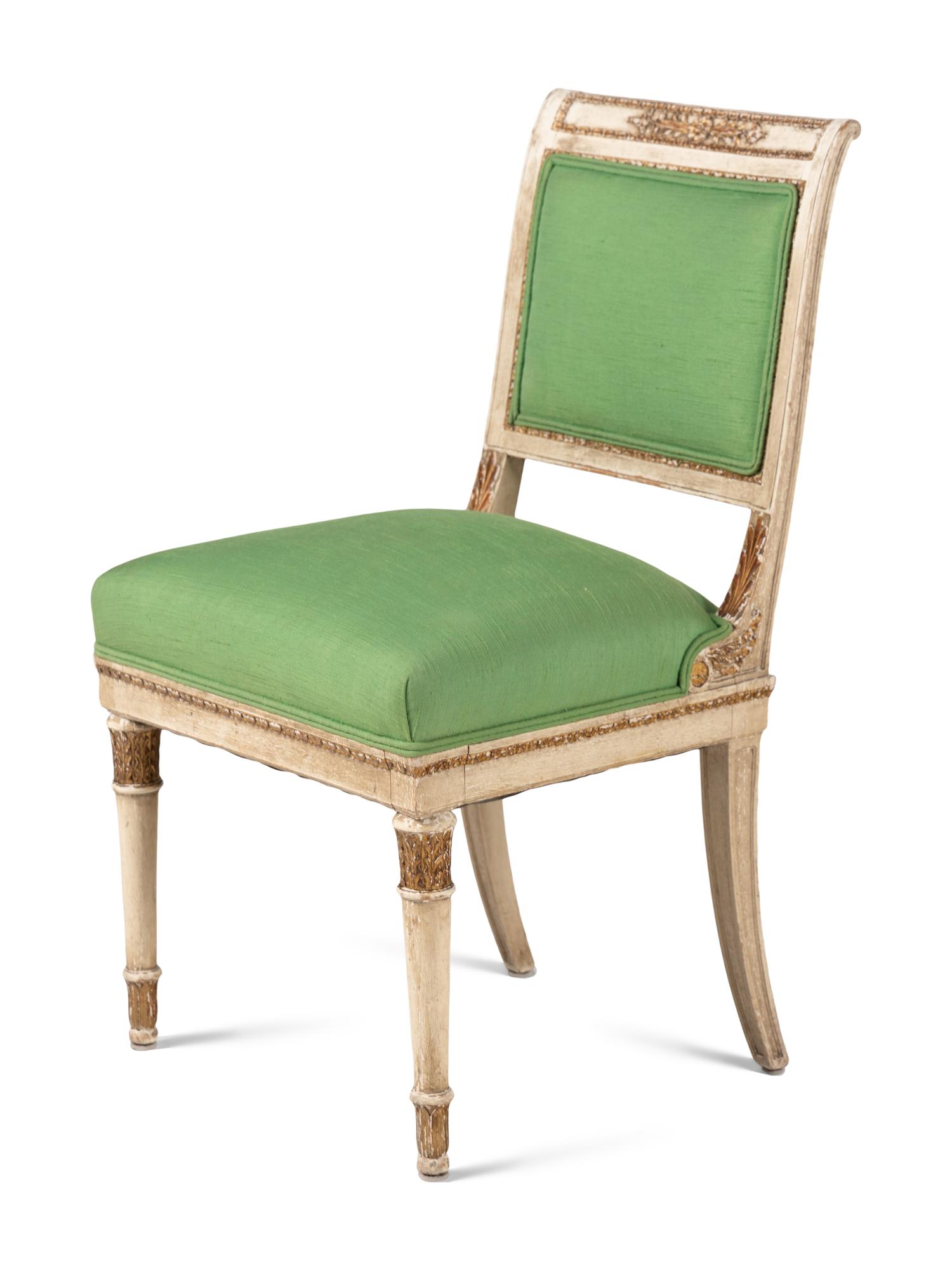 A Pair of Directoire Style White-Painted and Parcel Gilt Side Chairs