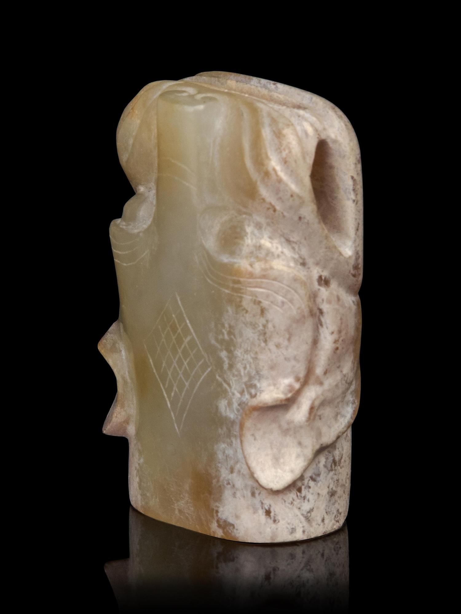 A White Jade Head of a Dragon