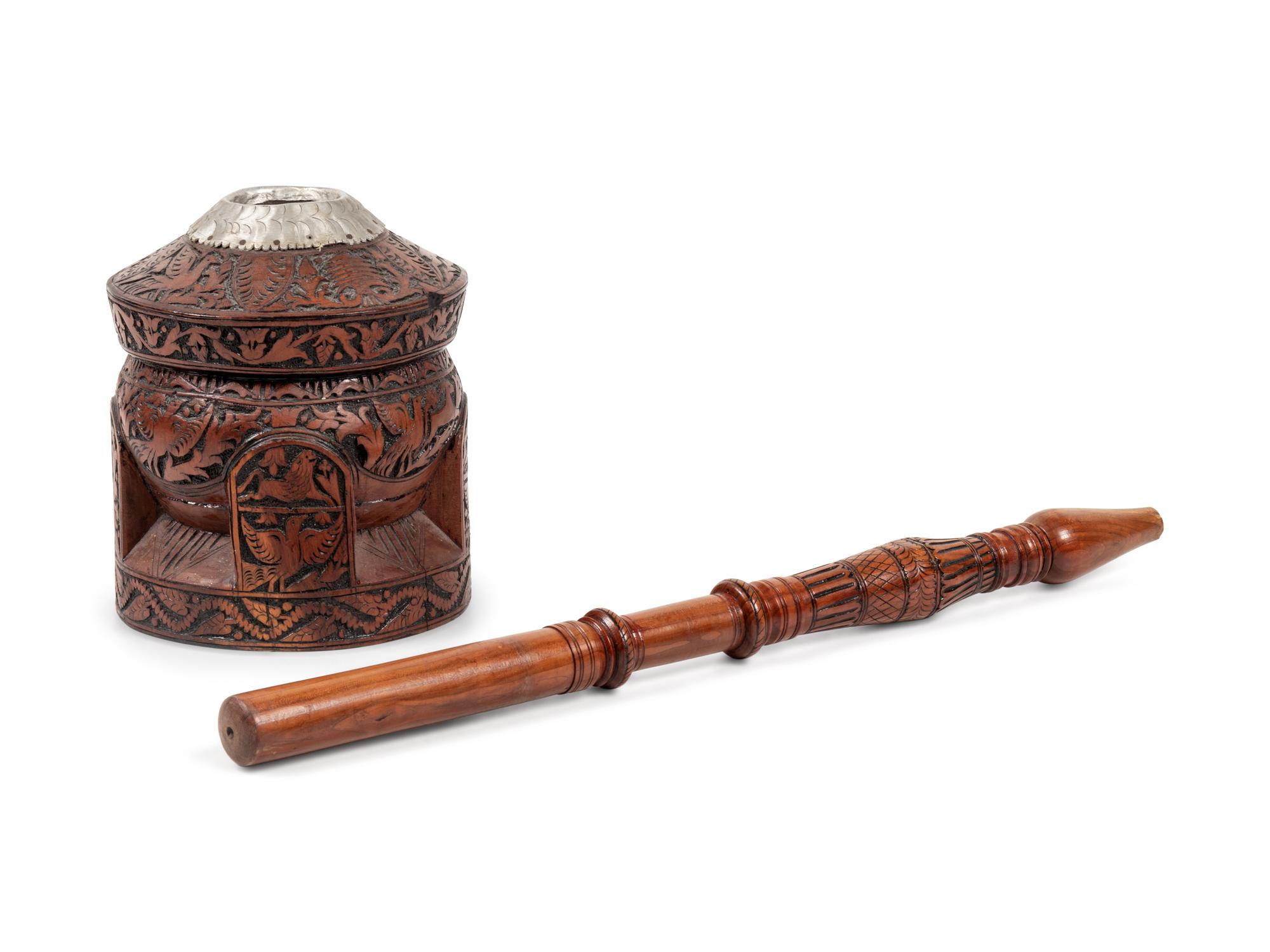 A Carved Walnut Coffee Mortar and Pestle