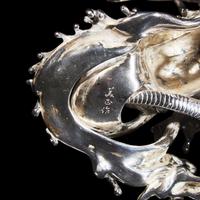 A Japanese Rock Crystal Sphere and Silver 'Dragon and Waves' Stand, Signed Yoshimasa Saku Meiji/Taisho Period 日本明治/大正時期 義正作潮を支配する珠と龍