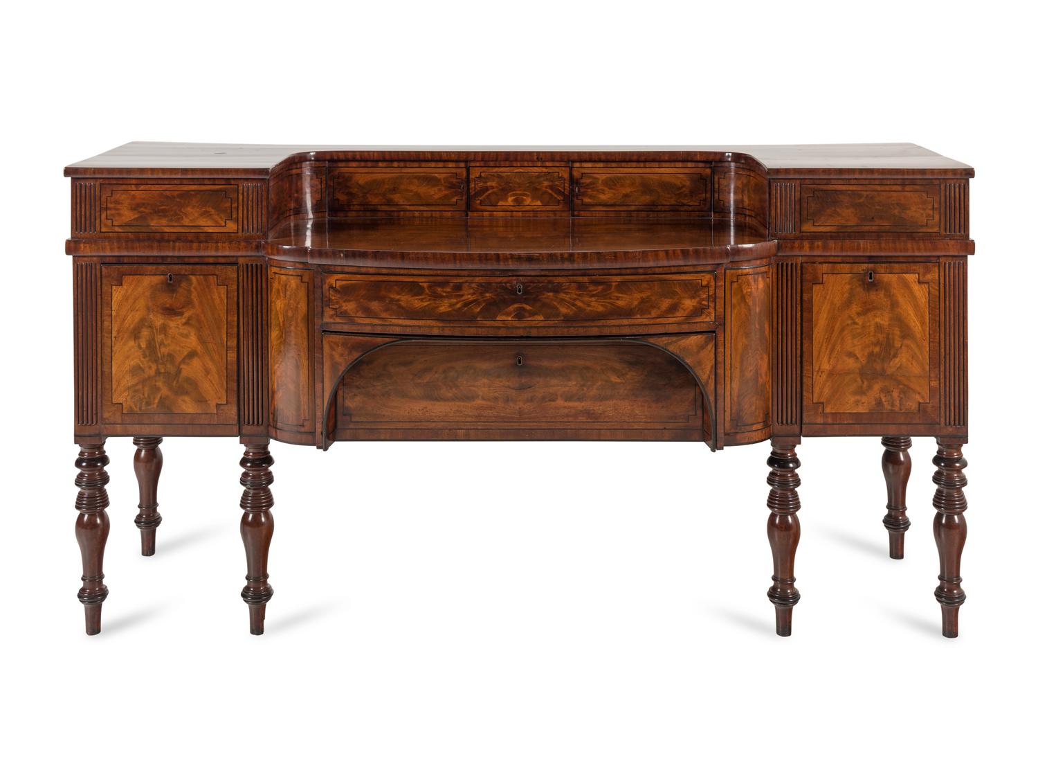 A Regency Mahogany and Parcel Ebonized Sideboard