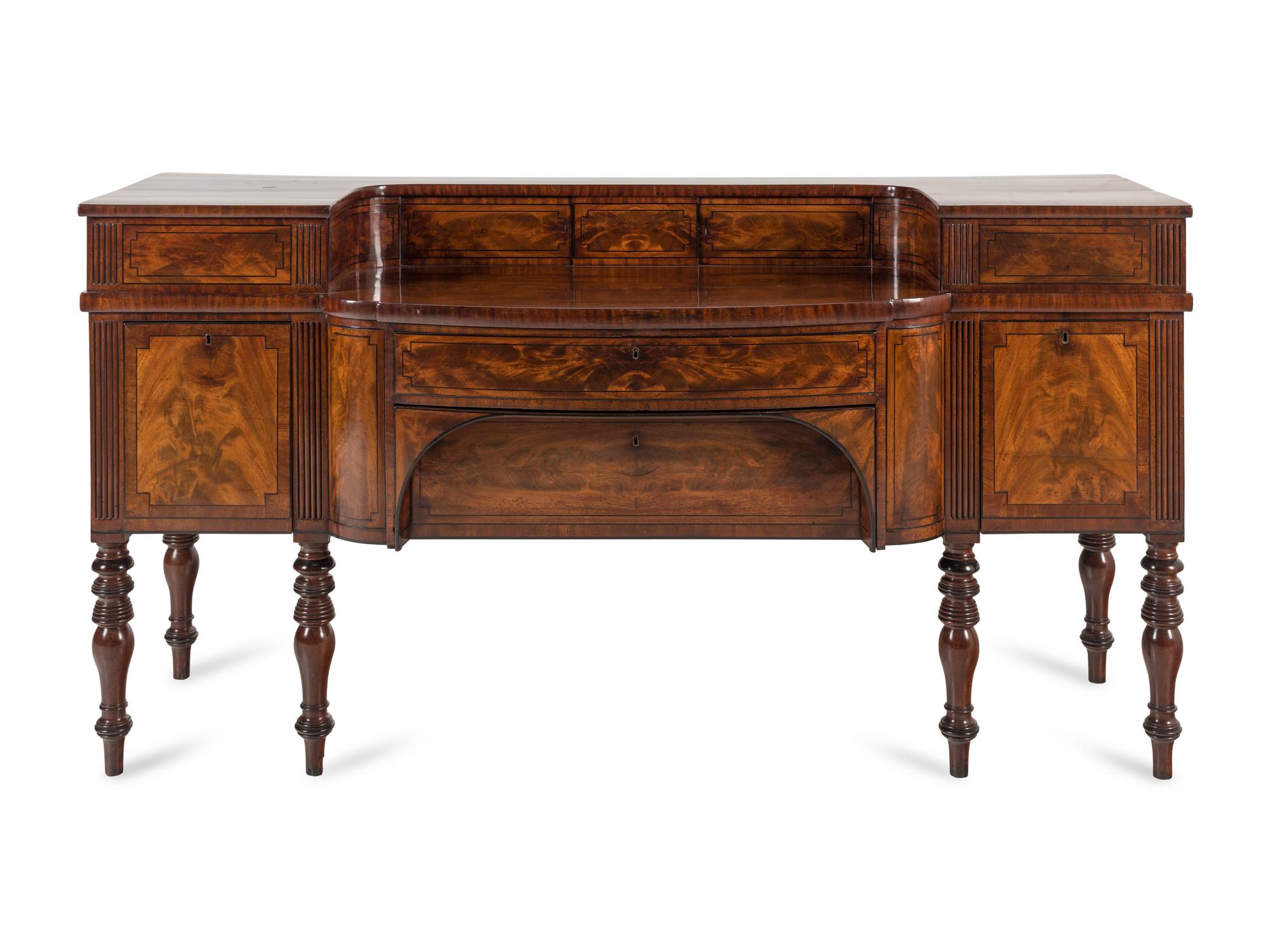 A Regency Mahogany and Parcel Ebonized Sideboard