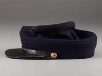 [CIVIL WAR] Private-purchase kepi and painted tintype, identified to Henry McCuen, Company D, 14th NY Heavy Artillery.