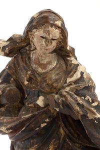 A Continental Painted and Parcel Gilt Carved Wood Figure of an Angel