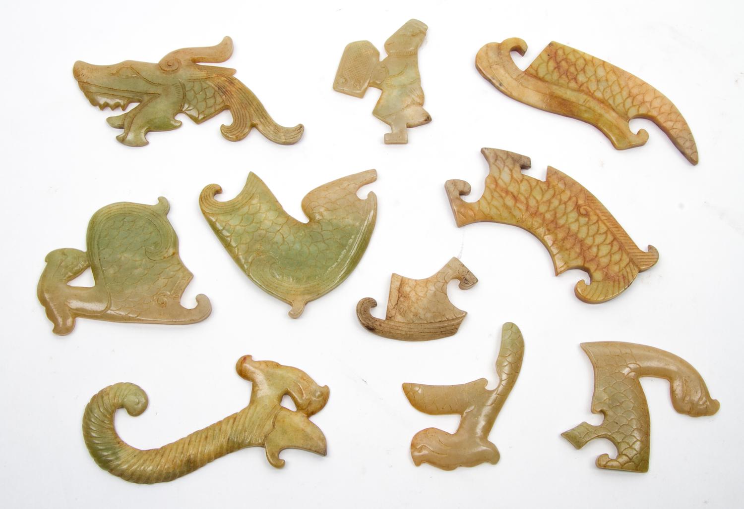 A Group of Ten Archaistic Jade Carvings Length of largest 4 1/2 inches.