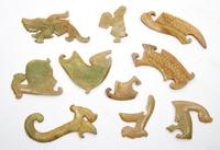 A Group of Ten Archaistic Jade Carvings Length of largest 4 1/2 inches.