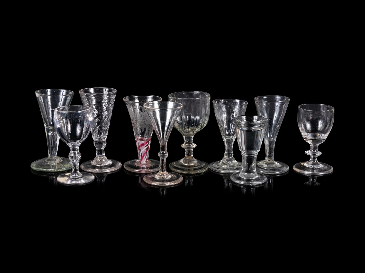 A Collection of Thirteen Assorted Glass Wine and Cordial Stems