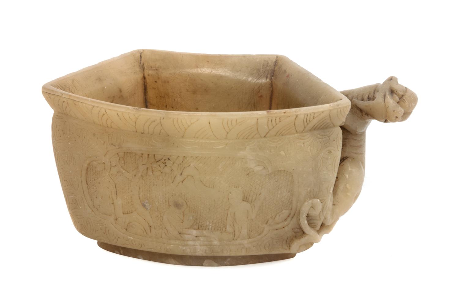 A Chinese Carved Soapstone Libation Cup Length 3 inches.